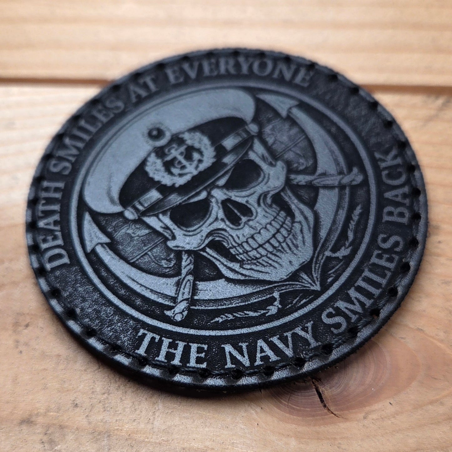 Death smiles at everyone - navy smiles back